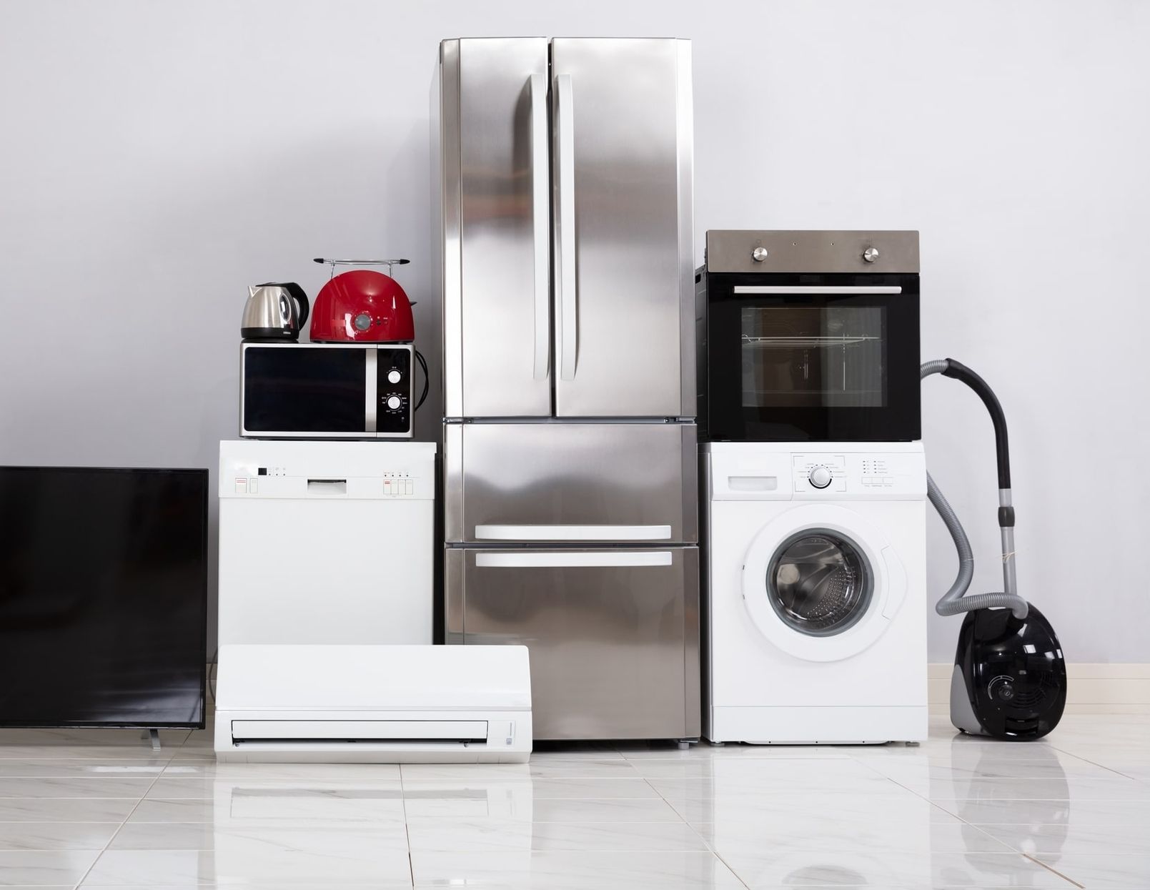 Moderne Haushaltsgeräte wie Kühlschrank Waschmaschine und Ofen energieeffiziente Elektrogeräte